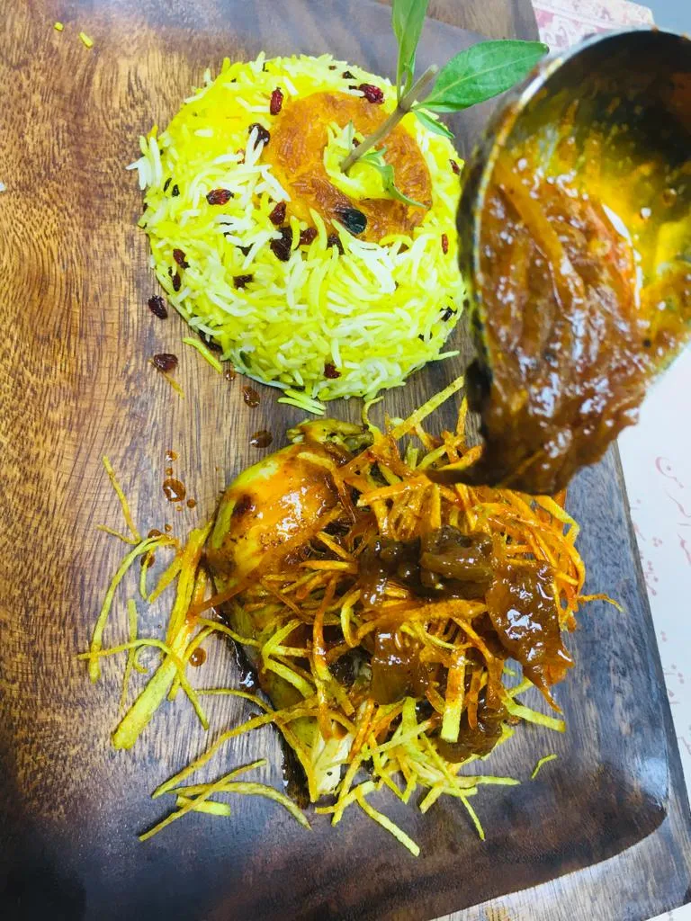 دجاج محمر مع أرز زرشك