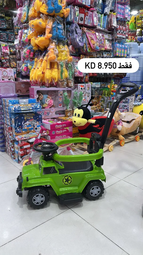 سيارة اطفال + عصا تحكم 14