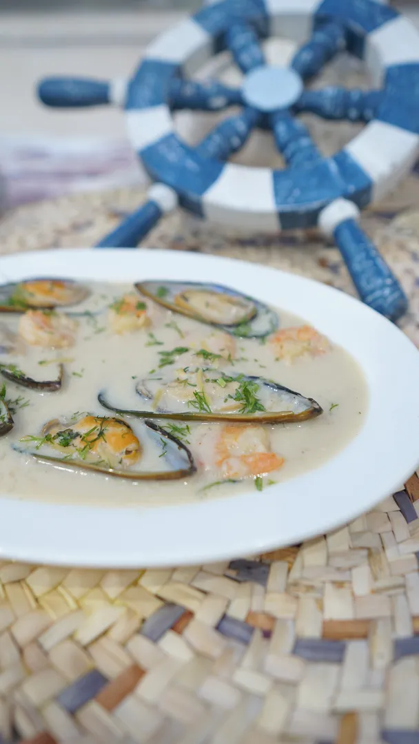 A Shrimps  Meal With Mussels in White Sauce  