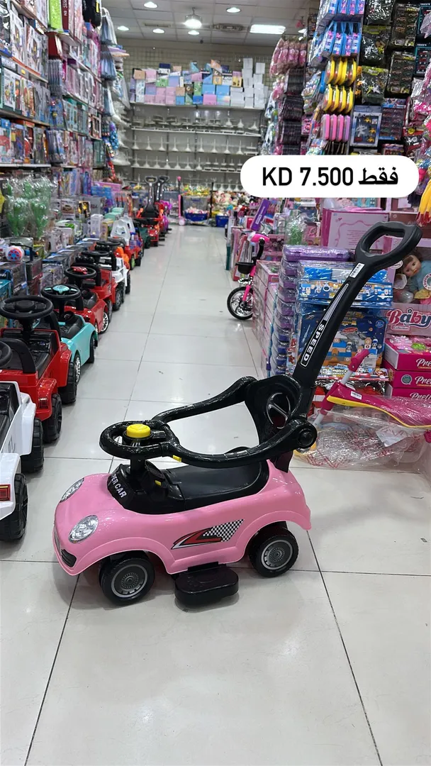 سيارة اطفال + عصا تحكم 13