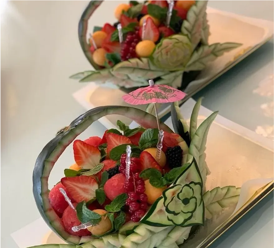 Watermelon basket with mix berries and strawberries