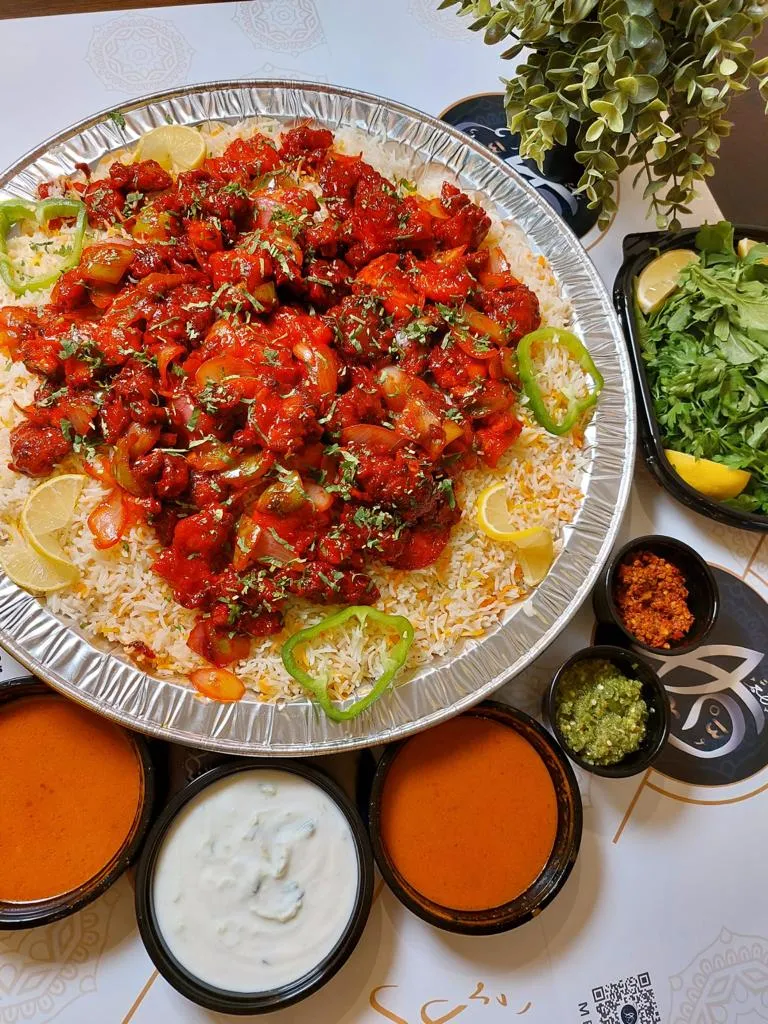 عرض صينية دجاج 65 مع عيش البرياني تكفي لاربع انفار