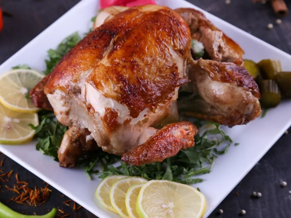 Half a chicken grilled on gas without the need