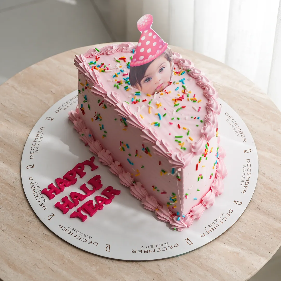 Half pink sprinkles cake with photos