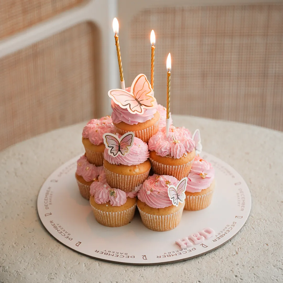 Pink cup cake tower butterfly
