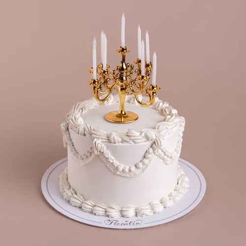 Classic white cake gold candleholder