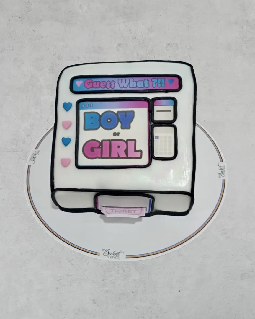 Gender Reveal Machine Cake