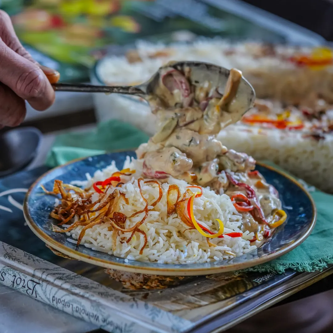 Cream of chicken with colored pepper and rice.